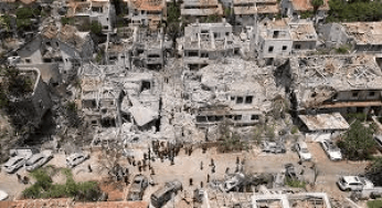 ‘It’s heavy on the heart’: Israelis survey damage in city hit by Iranian missile